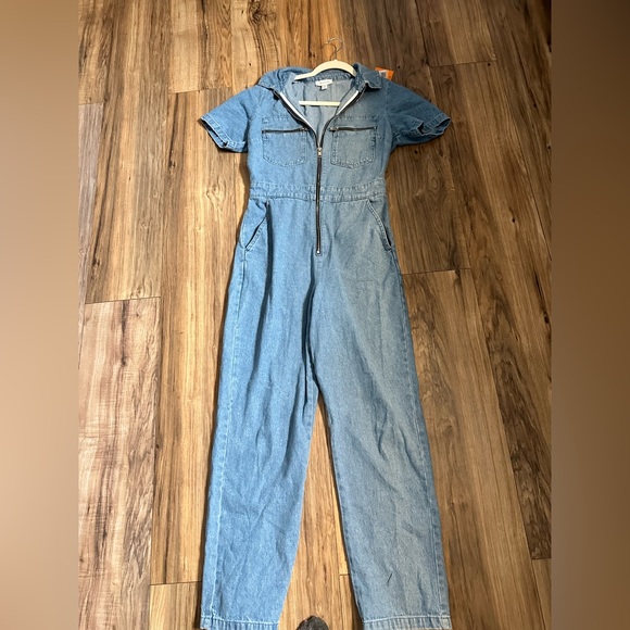 Topshop is a store the TV star often heads to. denim jumpsuit, - Picture 1 of 8